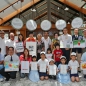 A group photo with Madame Hung Wai-lan and representatives of HCF and the participating units of the photo exhibition